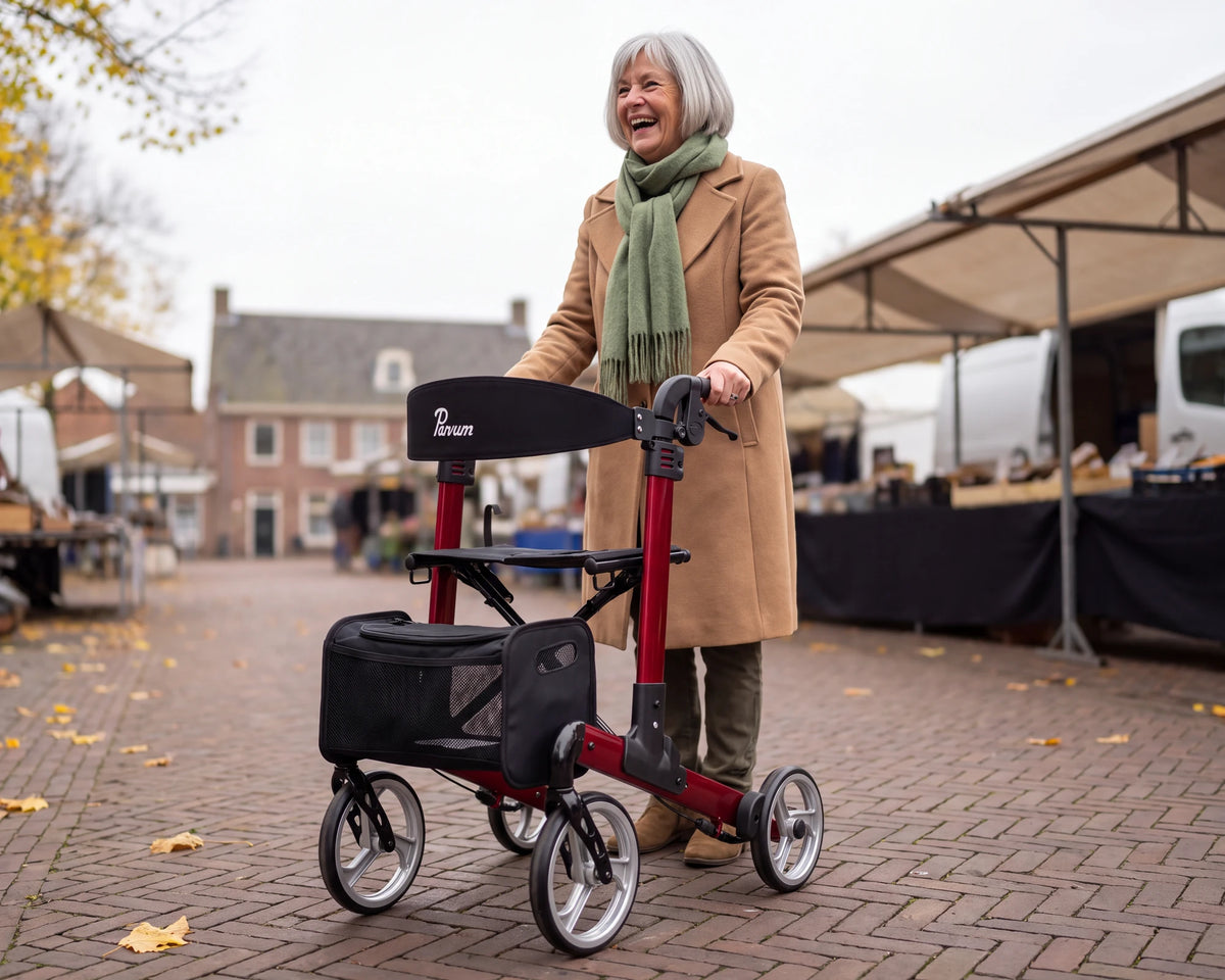 Parvum Luxo in ruby red at the market; a woman with gray hair laughs, her hands on the handles.