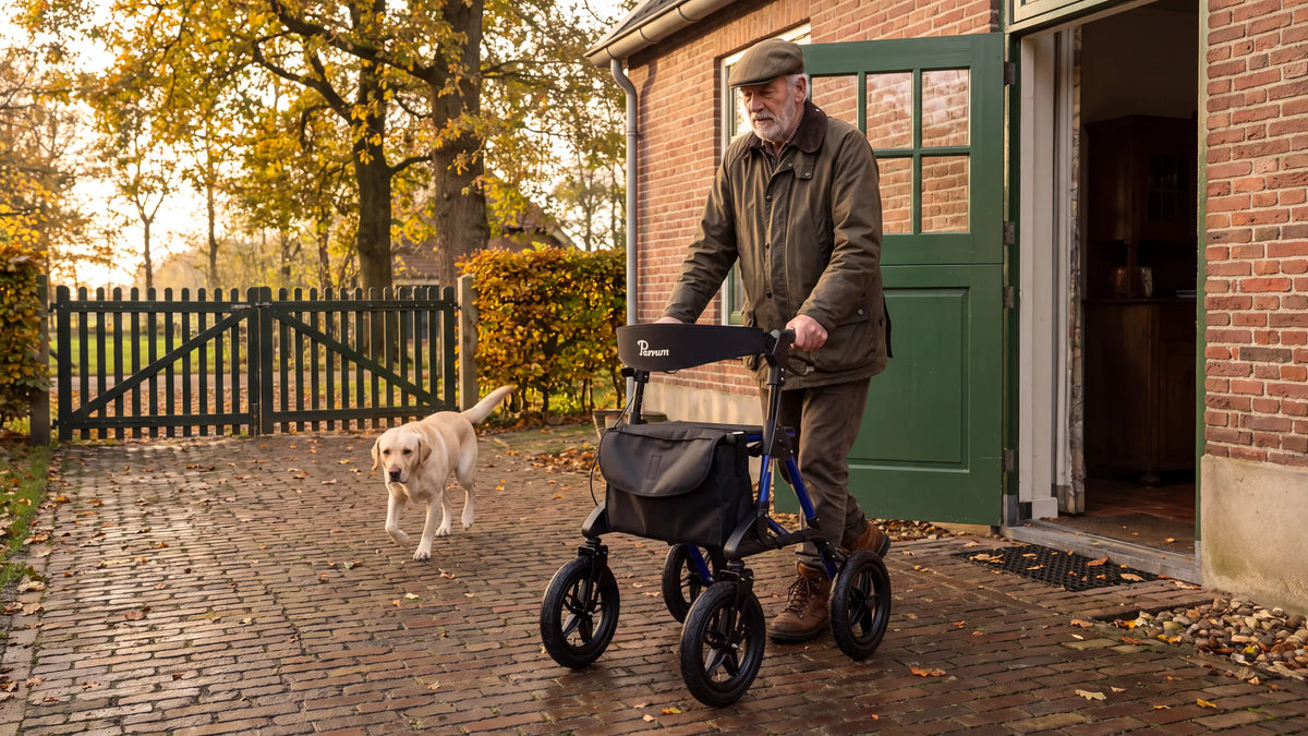 Parvum Rebel in blue on a farmyard; a man in a cap steps out of the back door, his Labrador leading the way.
